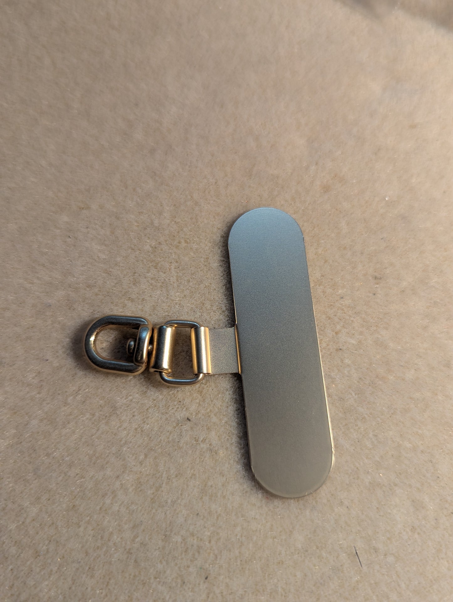 Swivel, rose gold metal cellphone lanyard tab