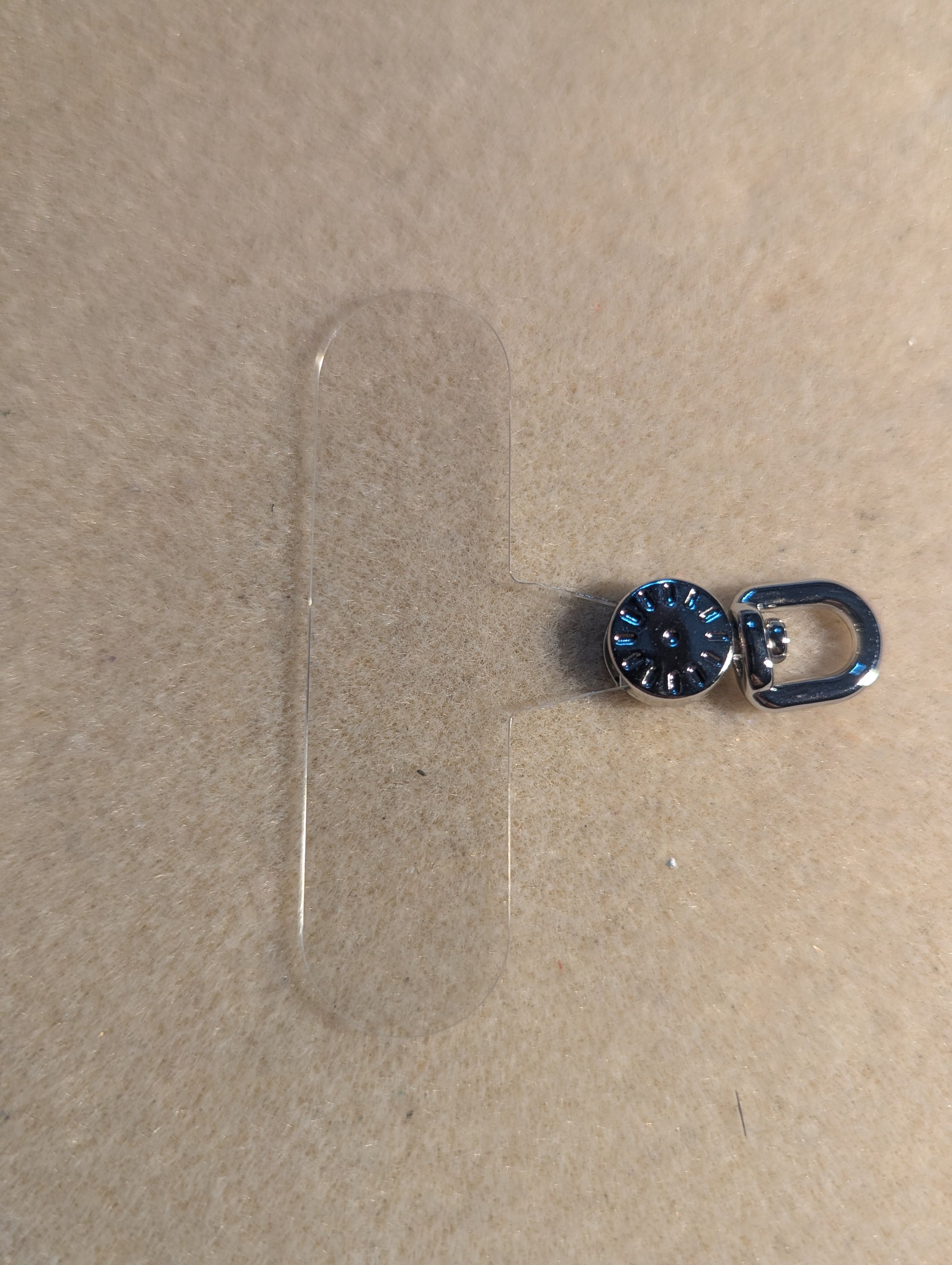 Swivel, plastic cell phone lanyard tab