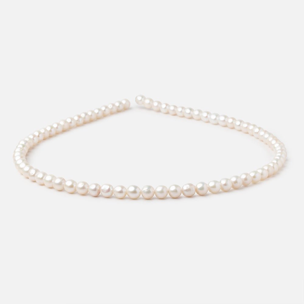 5-5.5mm Creamy White Petite Baroque Freshwater Pearls 15 inch 70 Beads