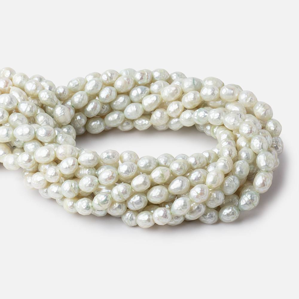 9x7mm Pale Mint Faceted Oval Freshwater Pearls 16 inch 33 pieces