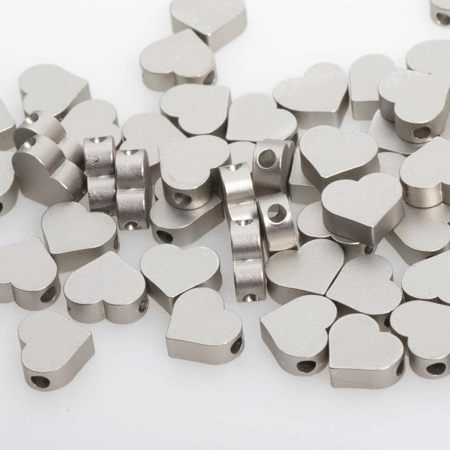 7mm x 6mm Solid Heart Bead - Made of plated zinc - Sold individually - K77
