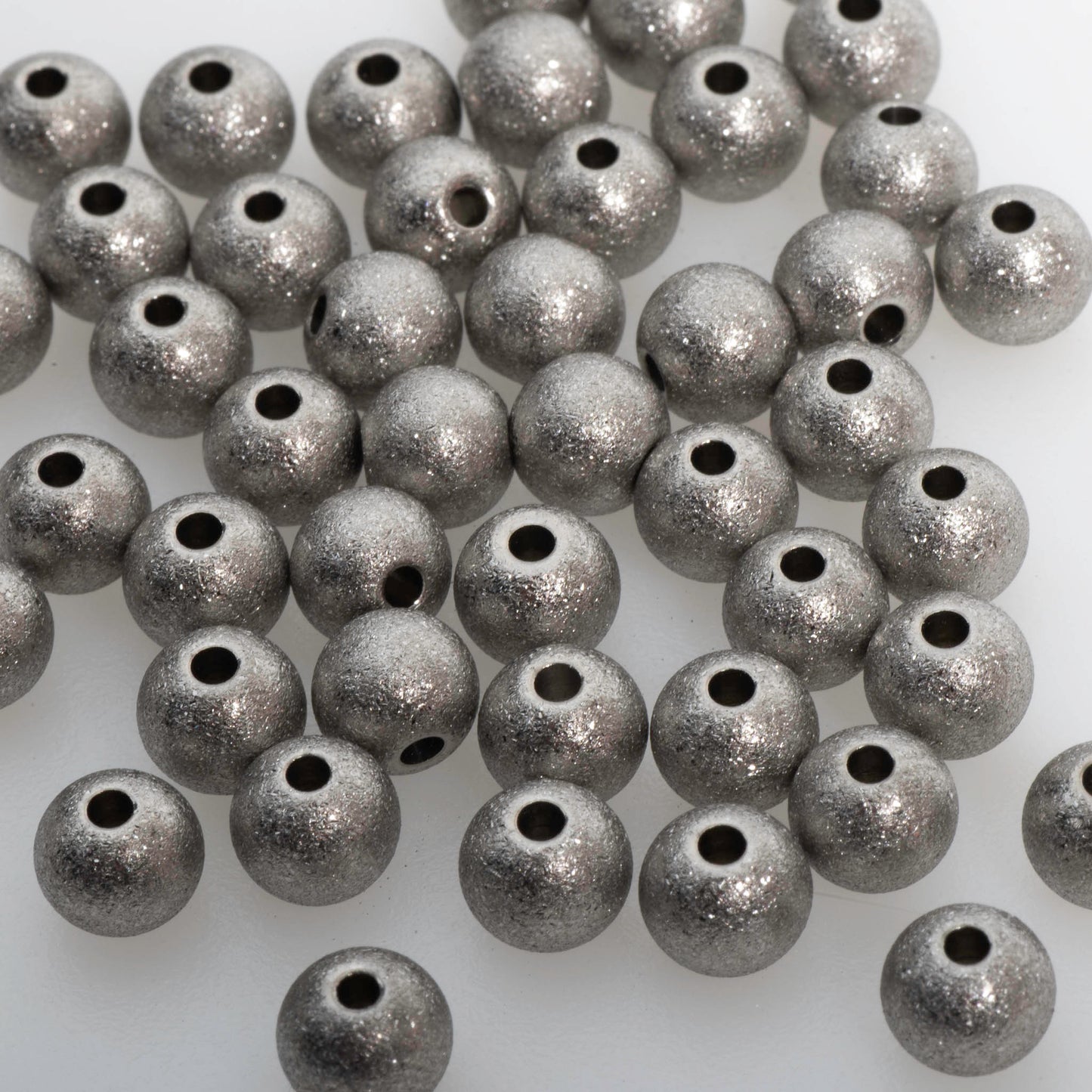 Sparkling Stardust Spacer Beads - Made of stainless steel - Sold individually - STAR4/SS, STAR6/SS, STAR8/SS