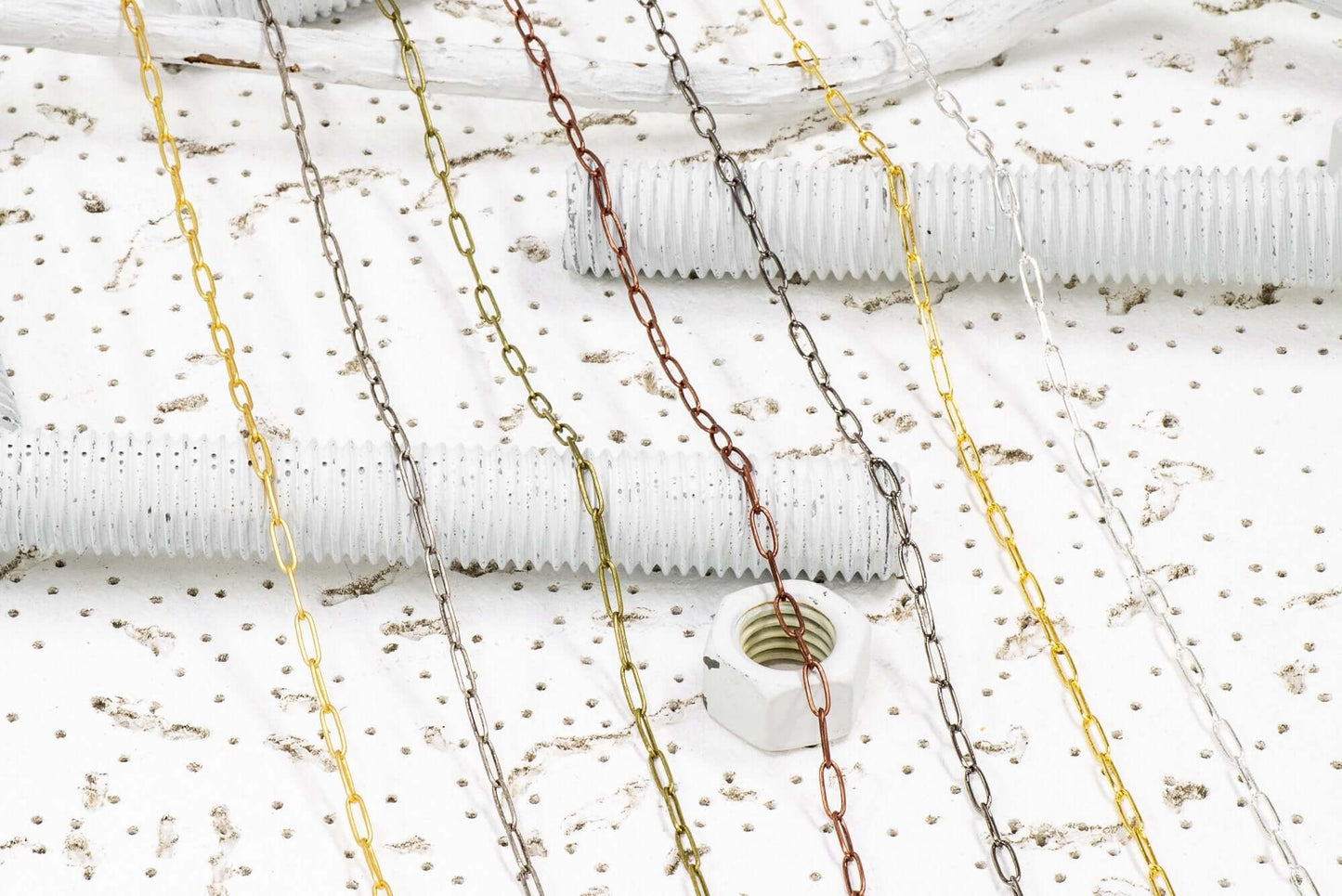 Tiny Paperclip Cable Chain measures 1.75mm x 5.9mm available in many Finishes sold by the Foot - CH 159