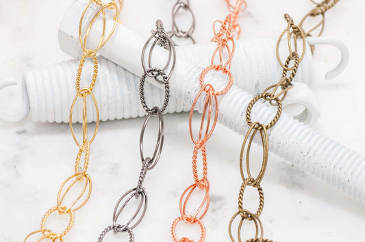 19mm x13mm Textured Oval with Two 24 x11mm Plain Oval Links Cable Chain sold by The Foot - CH 814