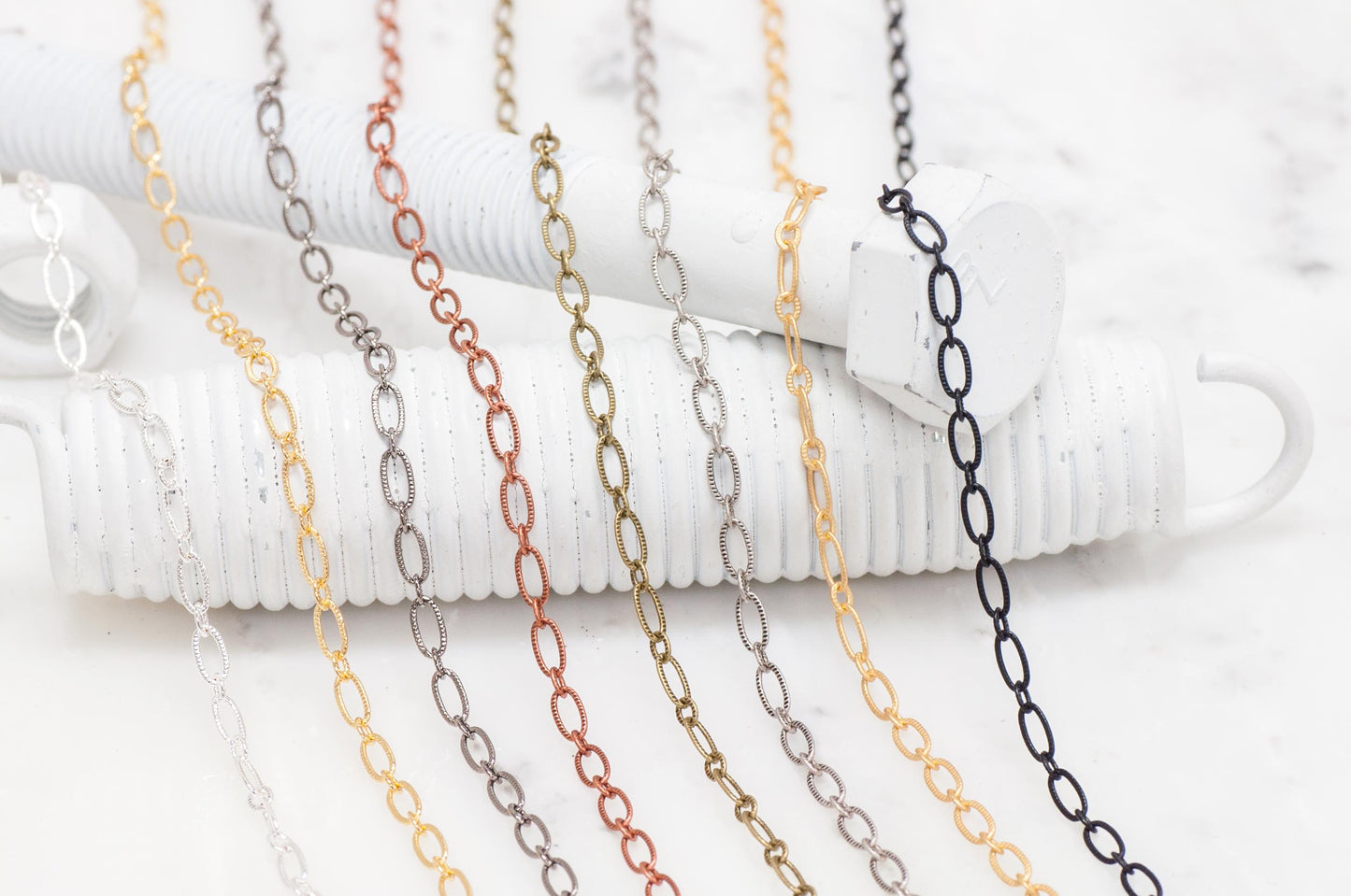 6.4mm x 3mm Textured Oval Cable Chain Sold by The Foot - CH 820