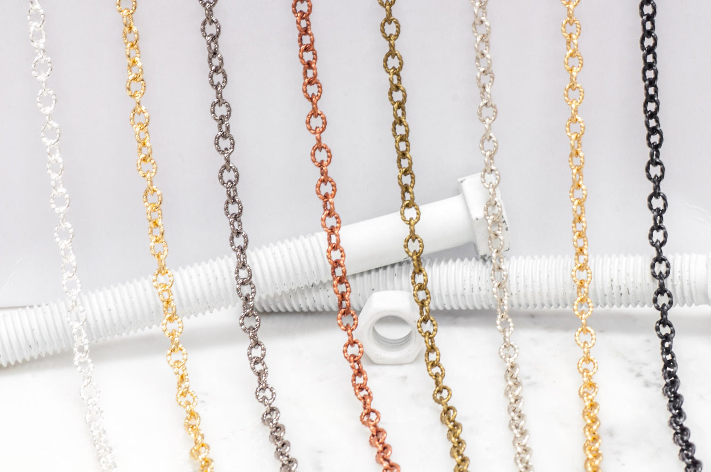 7.5mm x 6mm Twisted Link Cable Chain - Made of plated brass - Sold by the foot - Ch-858