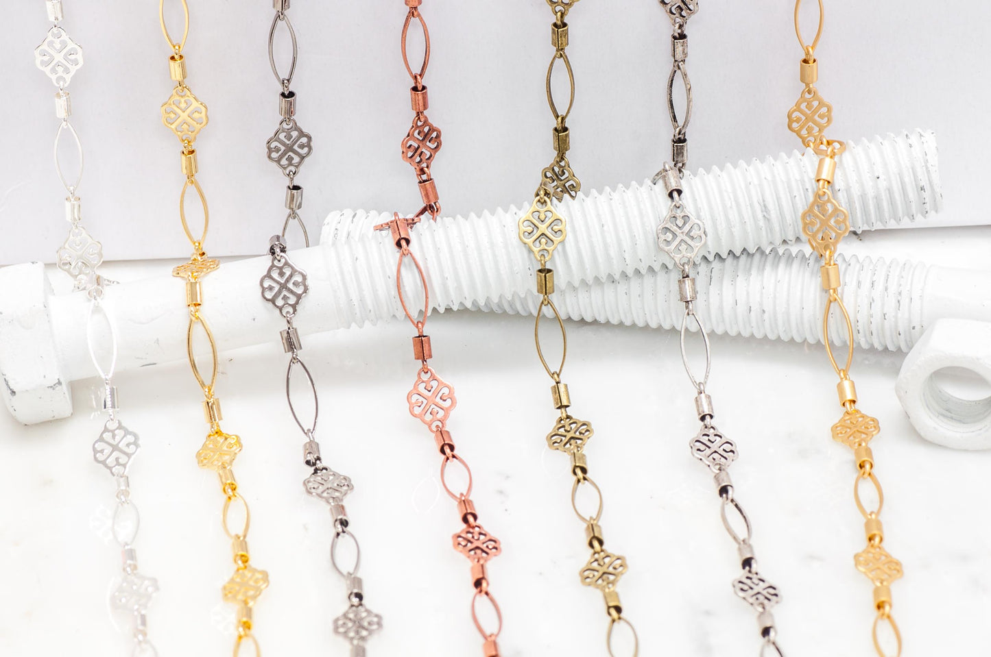 8mm Filigree, 4mm Barrel, and 11 x 5mm Eyelet Link Specialty Chain Sold by The Foot - CH 914