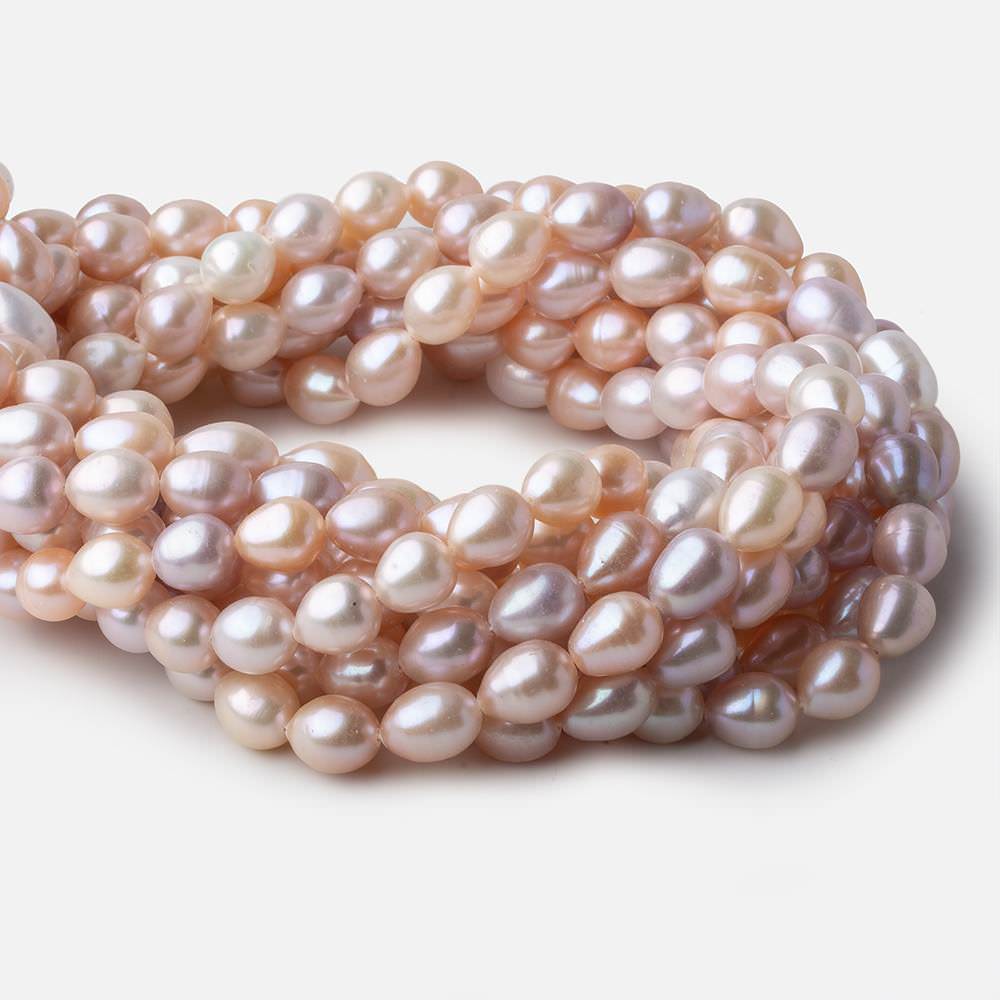 Pastel TriColor straight drilled oval Freshwater Pearls 16 inch 37 pearls 8x9-8x10mm A